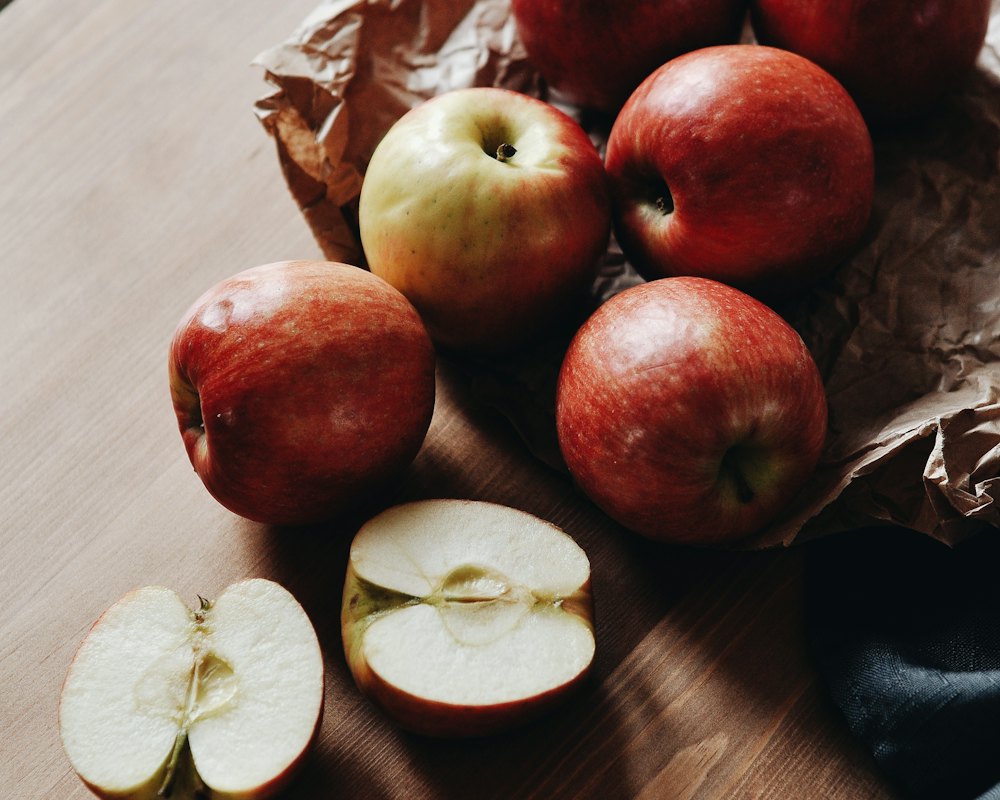 Red Empire apples piled in a wooden crate